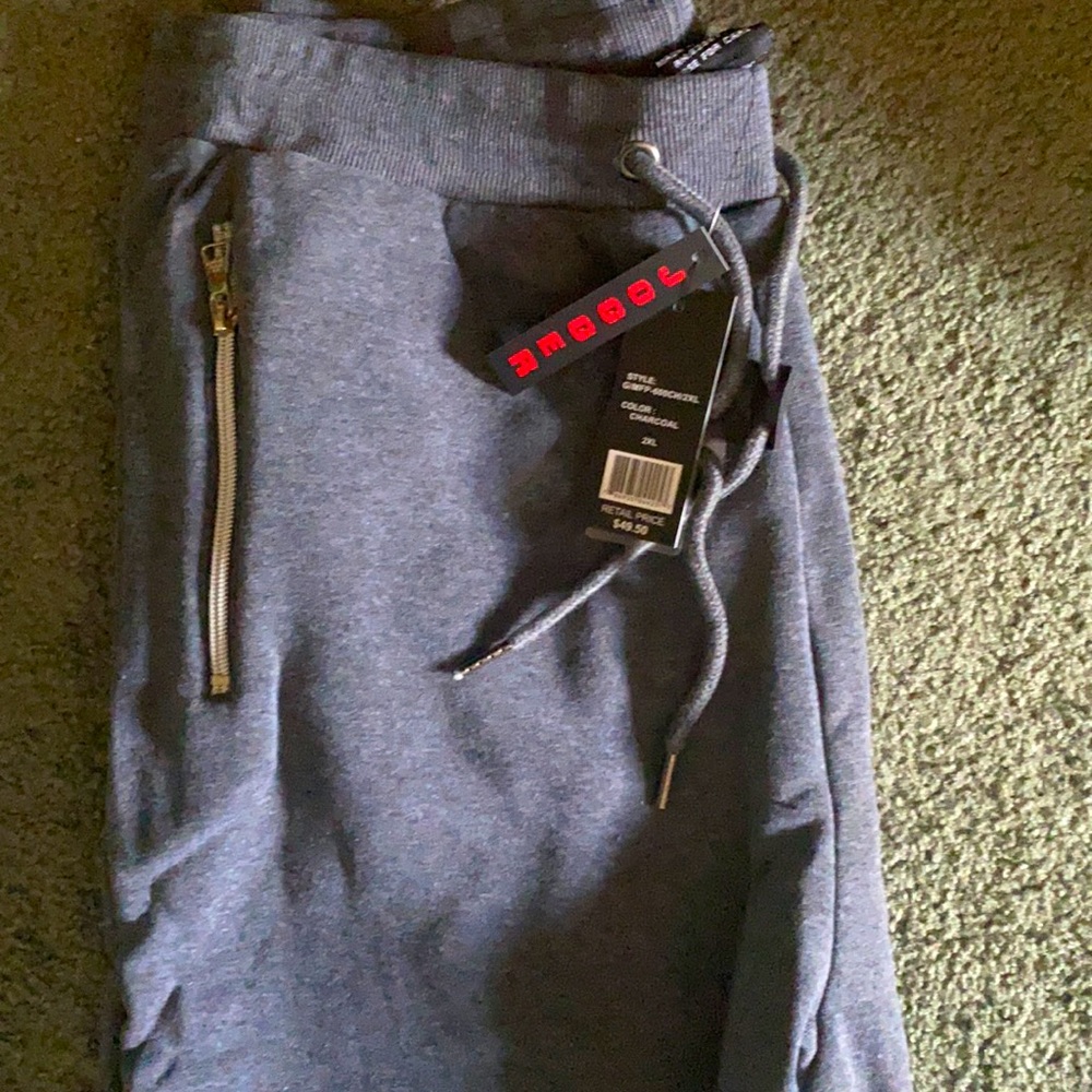 Brand new joggers with zippers